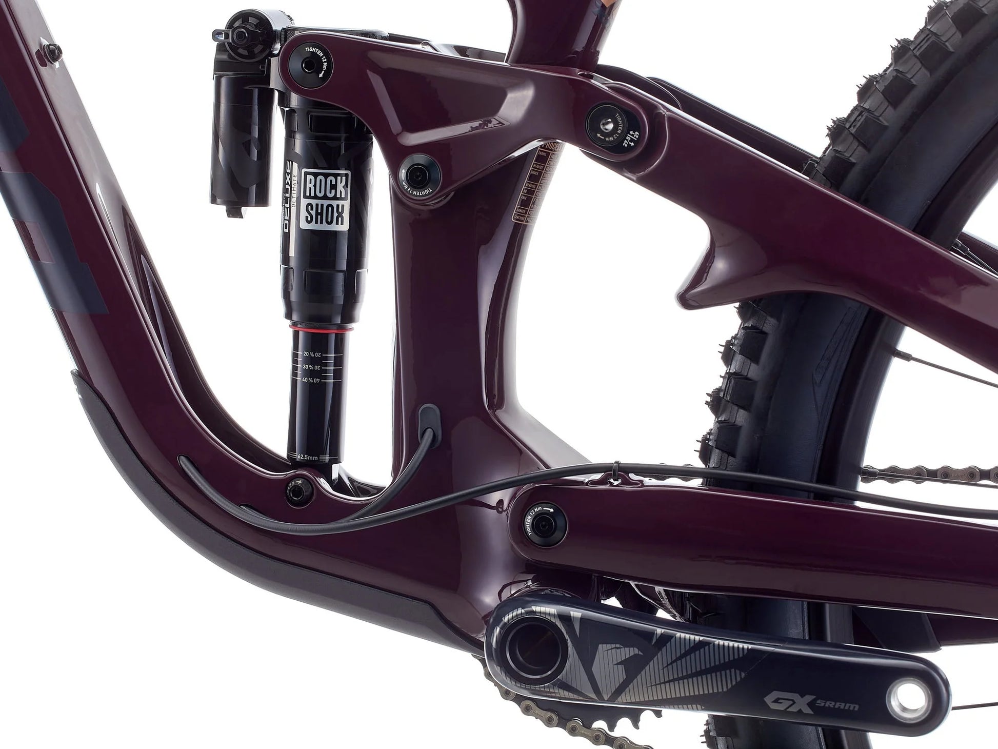 Close-up of a bicycle frame with Rock Shox suspension fork on a white background