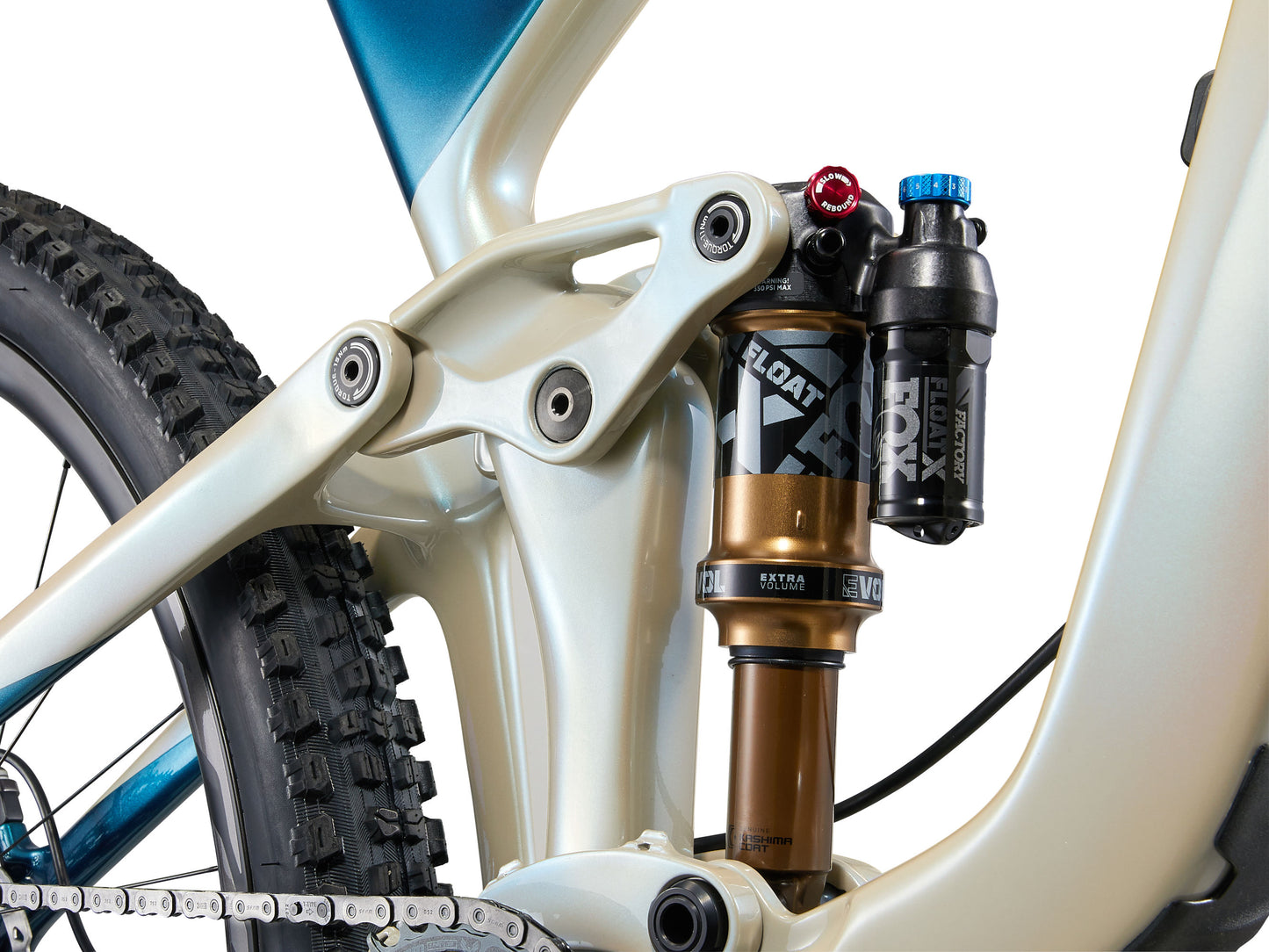 Close-up of a bicycle suspension fork with brand logos on a white background