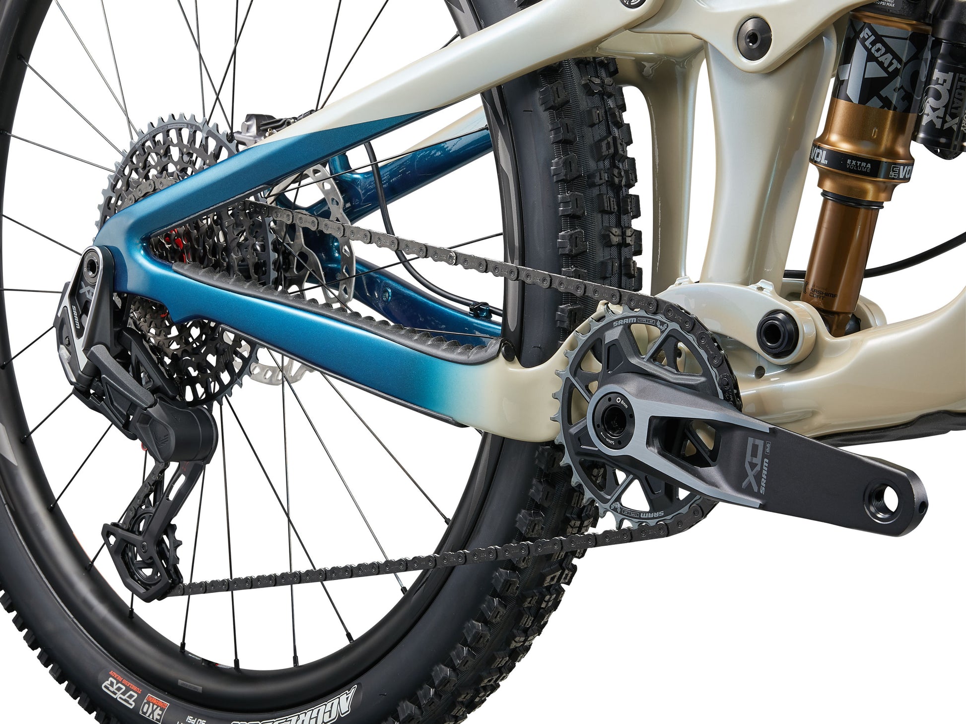Close-up of a mountain bike's chain and gear system on a white background