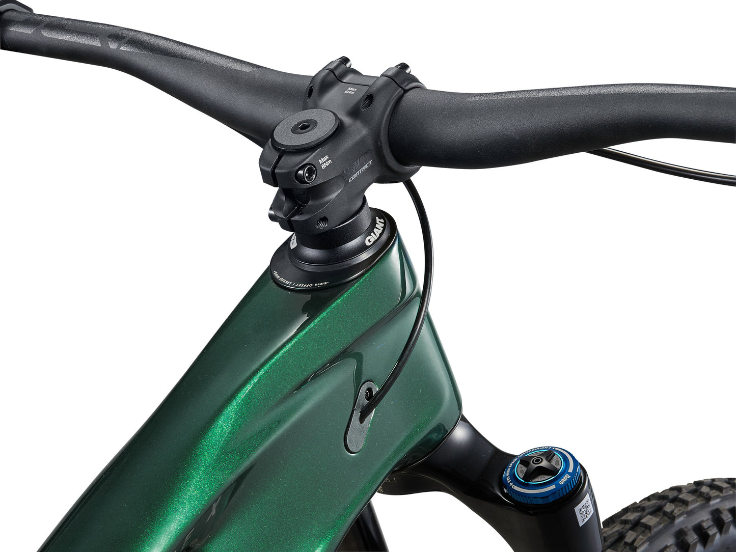 Close-up of a green bicycle handlebar with black grips on a white background