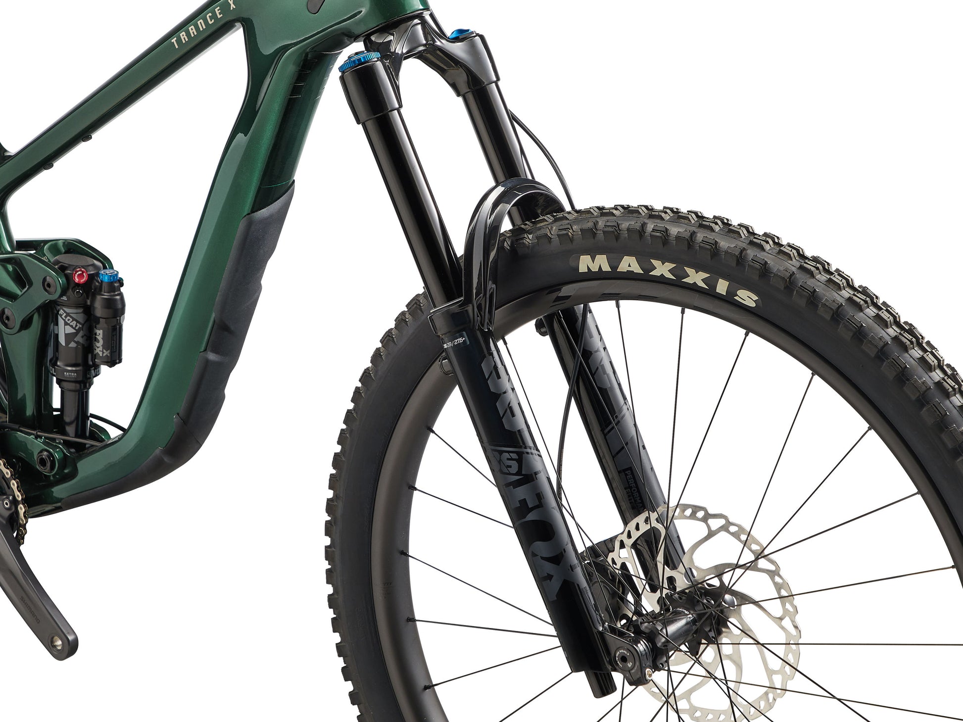 Green mountain bike with Maxxis tire on a white background