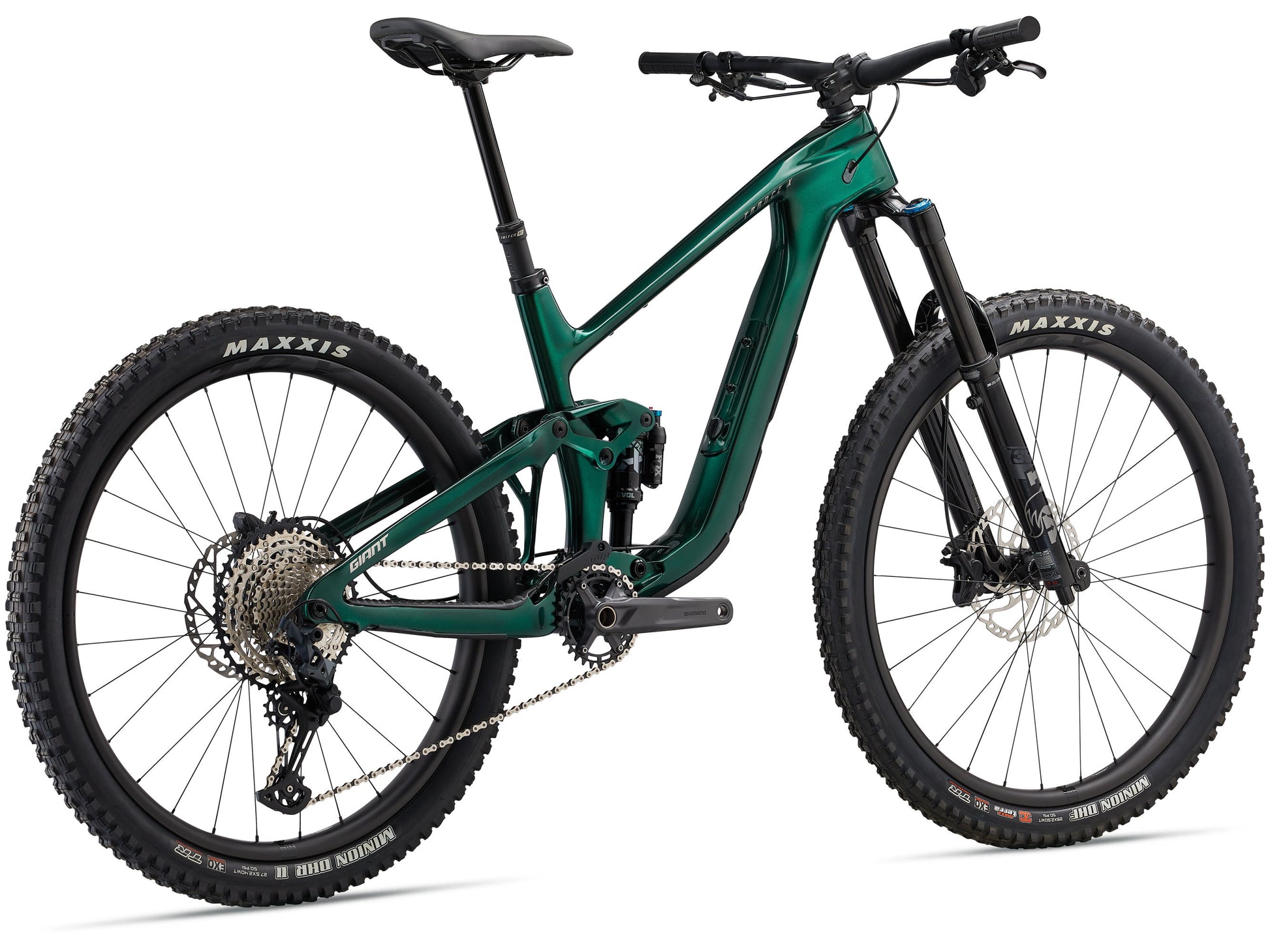Green mountain bike with Maxxis tires on a white background