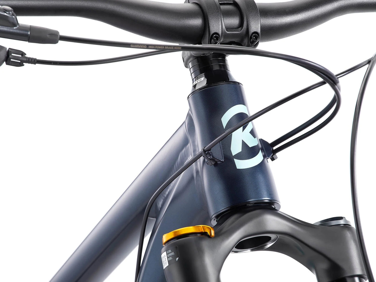 Close-up of a bicycle frame with a brand logo on a white background