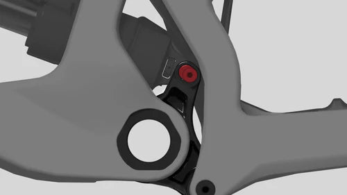Close-up of a mechanical component with a red dot on a gray background