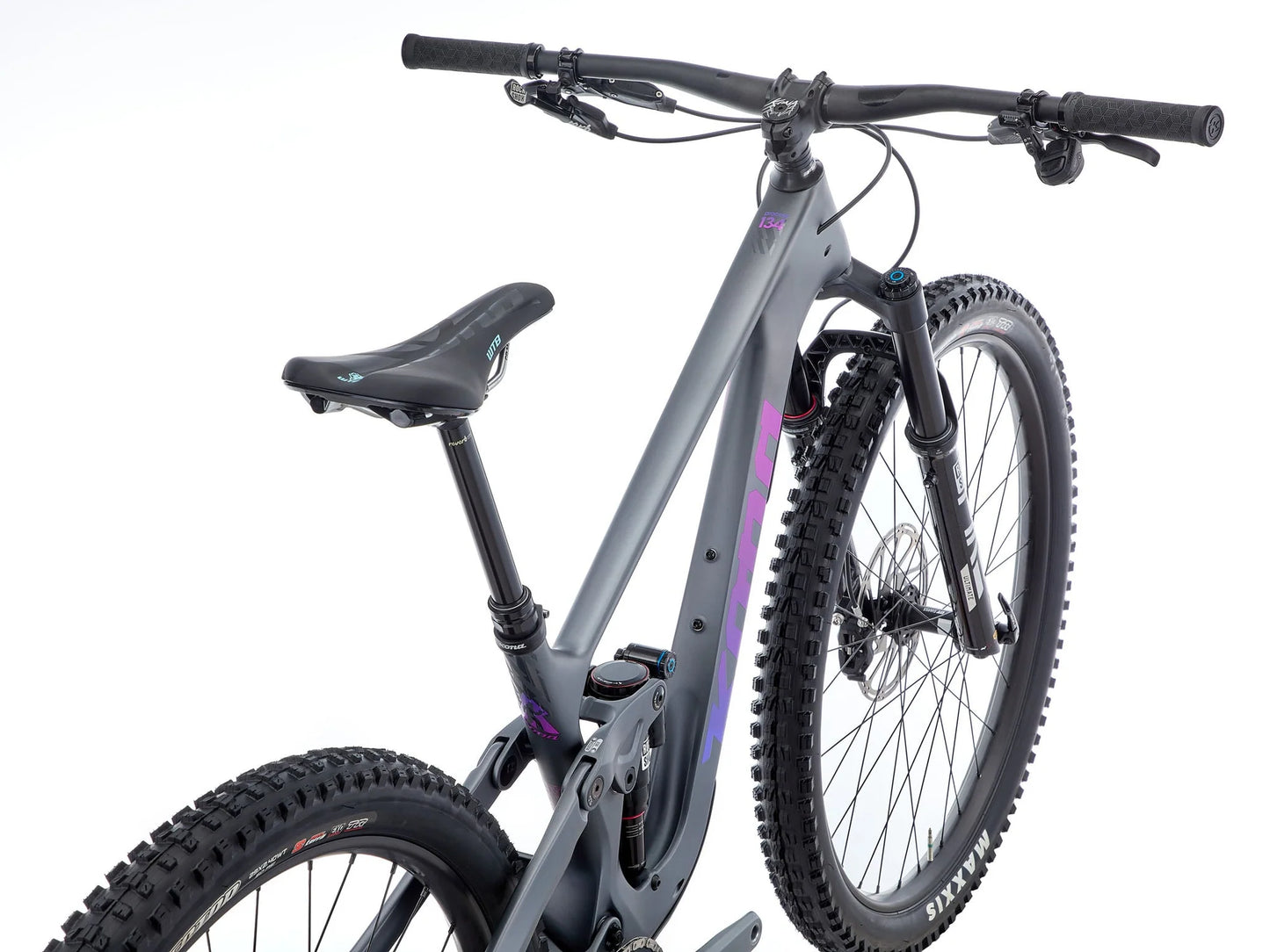Gray mountain bike with black seat and handlebars on a white background