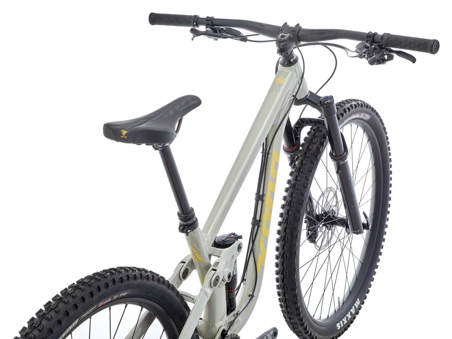White mountain bike with black components on a white background